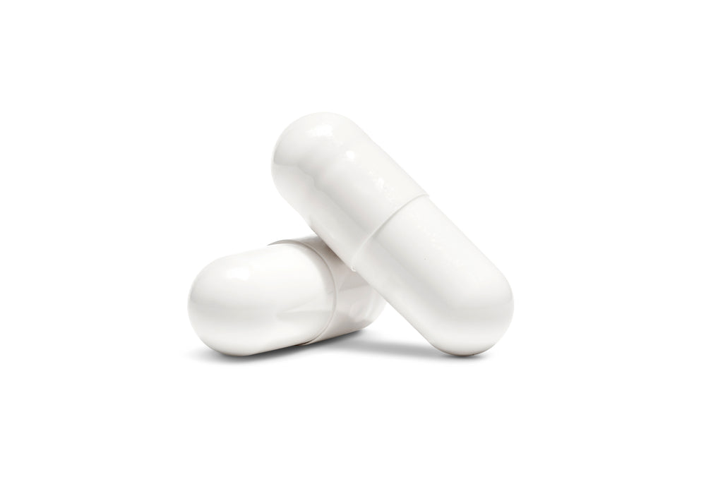 Two white kanna pills